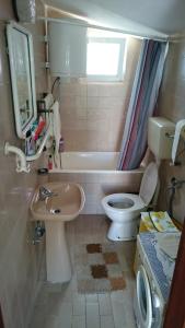 Koupelna v ubytování Adria MN Apartment + 30 fotografií