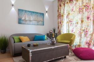 a living room with a couch and a table at Bepo Luxury Apartments in Split