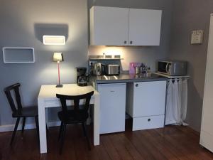 Kuchyň nebo kuchyňský kout v ubytování Nice n´Nordic 2