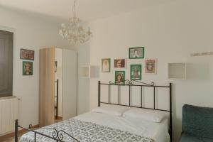 Postel nebo postele na pokoji v ubytování B&B Rosa Dalfonsina + 37 fotografií