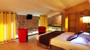 Postel nebo postele na pokoji v ubytování Logis auberge restaurant Du Vigneron