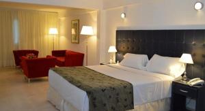 Una cama o camas en una habitación de Hotel Ríomío HABILITADO