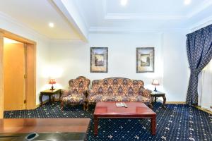 Χώρος καθιστικού στο Cayam Hotel