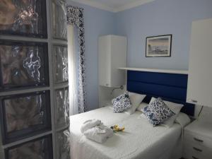 Giường trong phòng chung tại Hotel La Gioiosa