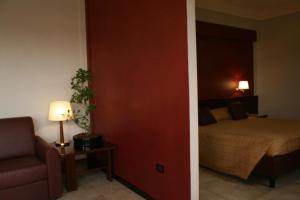Postel nebo postele na pokoji v ubytování Hotel Forum