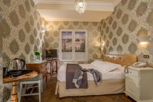 TV a/nebo společenská místnost v ubytování Boutique Hotel Anahi