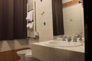 Koupelna v ubytování Hotel Forum