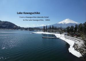 a view of a lake with a mountain in the background at Kawaguchiko Lakeside Hotel in Fujikawaguchiko