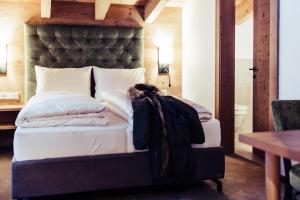 Posteľ alebo postele v izbe v ubytovaní Biohotel Bergzeit