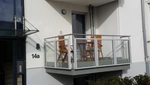 Balkón nebo terasa v ubytování Ferienwohnung Dünenperle