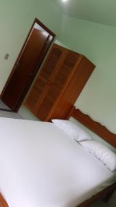 Posteľ alebo postele v izbe v ubytovaní Pousada da Nalva