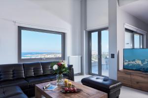 A television and/or entertainment centre at Elysium Seaview Oasis