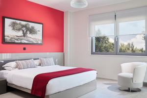 A bed or beds in a room at Elysium Seaview Oasis