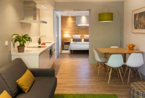 Ruang duduk di Apartamentos Casona de la Paca