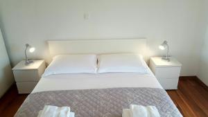 Een bed of bedden in een kamer bij Apartment Mia