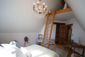 Ein Bett oder Betten in einem Zimmer der Unterkunft The French Country House, Tauranga