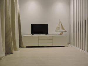 TV a/nebo společenská místnost v ubytování Sao Rafael - Apartamento Studio