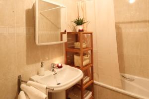 Koupelna v ubytování Apartamentos Lido + 16 fotografií