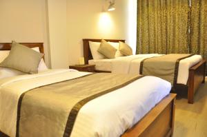 Letto o letti in una camera di Forest View Lodge