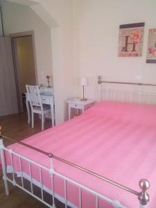 A bed or beds in a room at Oikia Preveza