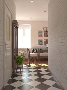 a hallway with a black and white checkered floor at Art Studio in Tashkent