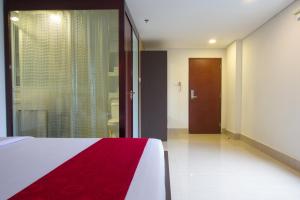 Postel nebo postele na pokoji v ubytování Mars City Hotel