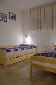 Postel nebo postele na pokoji v ubytování Pohoda Morava