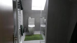 Łazienka w obiekcie City Apartment Vasiri