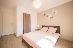 Cama ou camas em um quarto em Résidence La Source