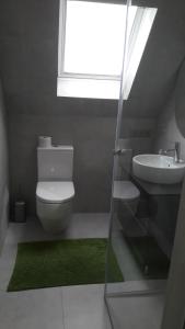 Łazienka w obiekcie City Apartment Vasiri