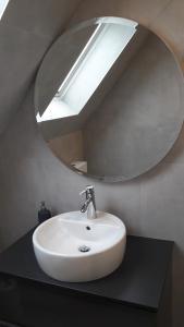Łazienka w obiekcie City Apartment Vasiri