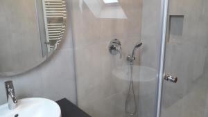 Łazienka w obiekcie City Apartment Vasiri