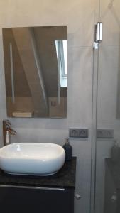 Łazienka w obiekcie City Apartment Vasiri