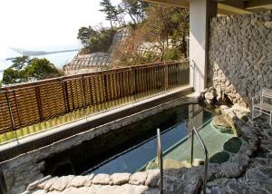En balkong eller terrass på Kokumin Shukusha Marine Terrace Ashiya