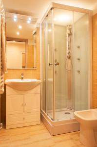 a bathroom with a shower and a sink at Rooms Palazzo Paladini in Lecce