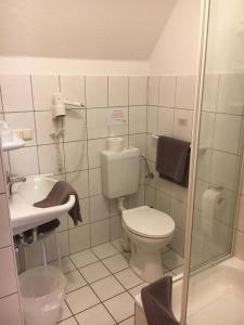 Koupelna v ubytování Dithmarscher Haus