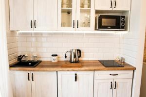 Kuchnia lub aneks kuchenny w obiekcie Gold Box Apartament