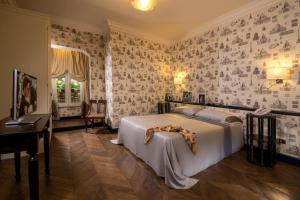 Postel nebo postele na pokoji v ubytování Boutique Hotel Anahi + 37 fotografií