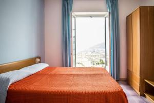 Кровать или кровати в номере Hotel Internazionale