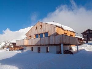 Chalet Bergfink v zimě + 19 fotografií
