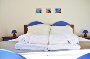 Postel nebo postele na pokoji v ubytování Gulliver + 12 fotografií