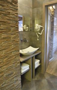 Kúpeľňa v ubytovaní Hotel Via Ironia