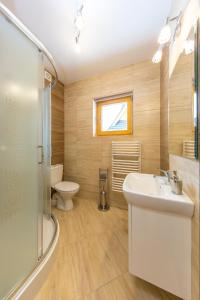 Ένα μπάνιο στο Góralskie Zacisze Domki +14 φωτογραφίες