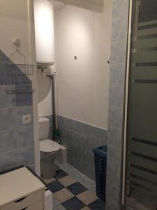 a bathroom with a toilet and a sink at 36 M2 between Presqu'île and university in Lyon