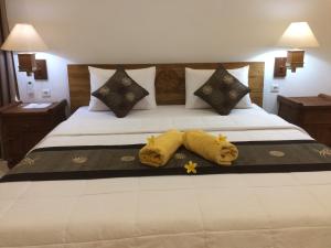 Кровать или кровати в номере Ubud Rooms B&B