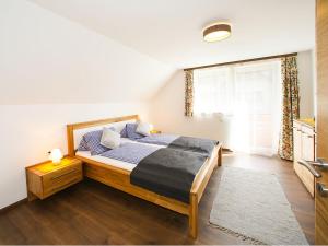 Postel nebo postele na pokoji v ubytování Ferienhaus Pichler
