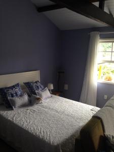 En eller flere senge i et værelse på Loft Aconchego da Serra + 23 billeder