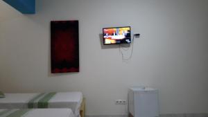 TV a/nebo společenská místnost v ubytování LT Aparthotel