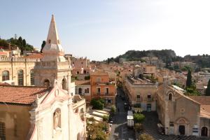 A general view of Taormina or a view of the city taken from the holiday home