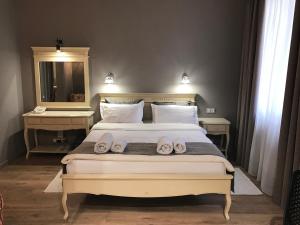 Ένα ή περισσότερα κρεβάτια σε δωμάτιο στο Aparthotel